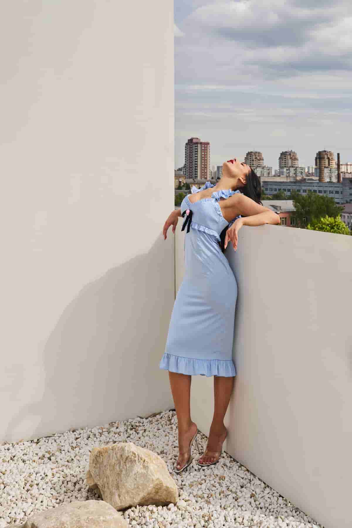 Blue sundress with a rose on the chest