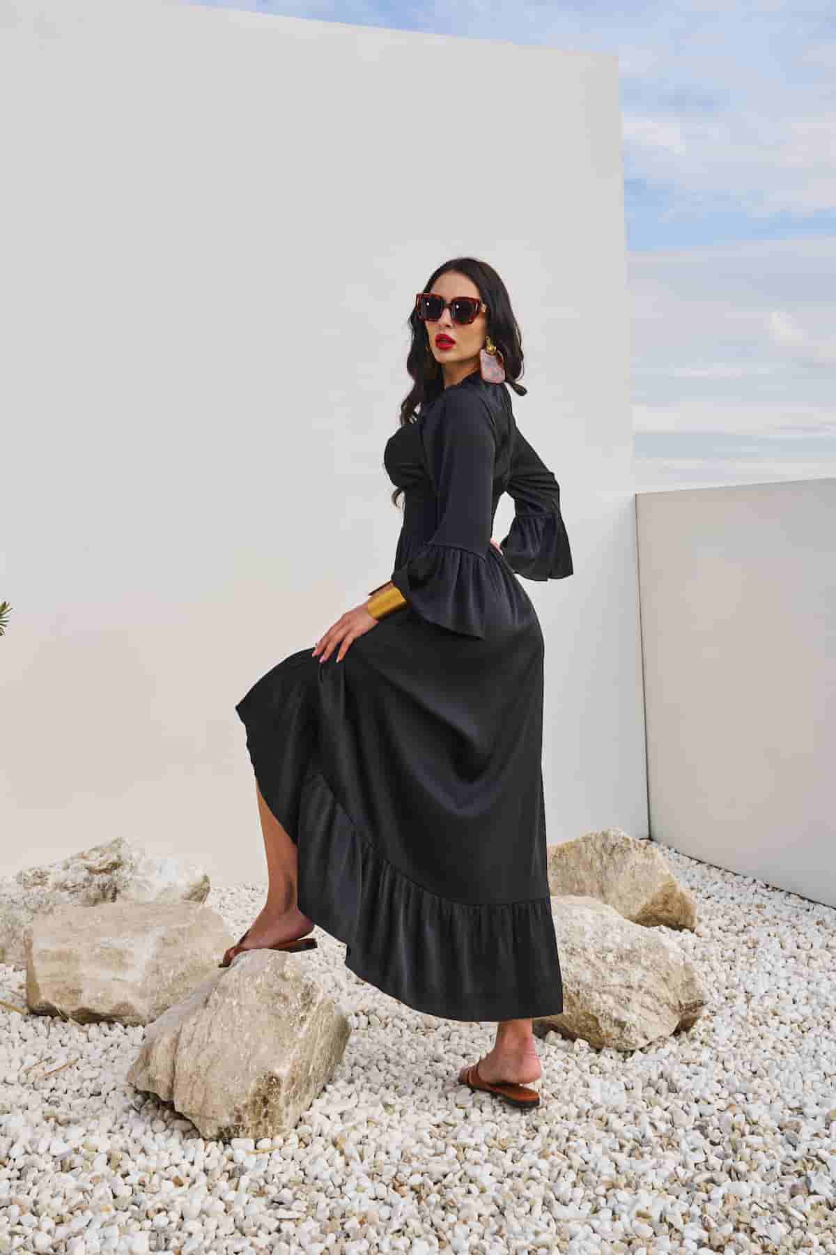 Black dress made of pressed silk with elastic at the waist
