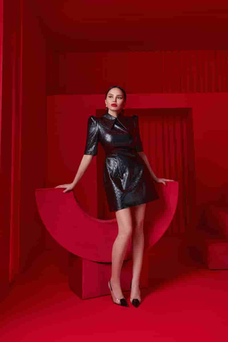 Black leather mini dress with a pointed collar