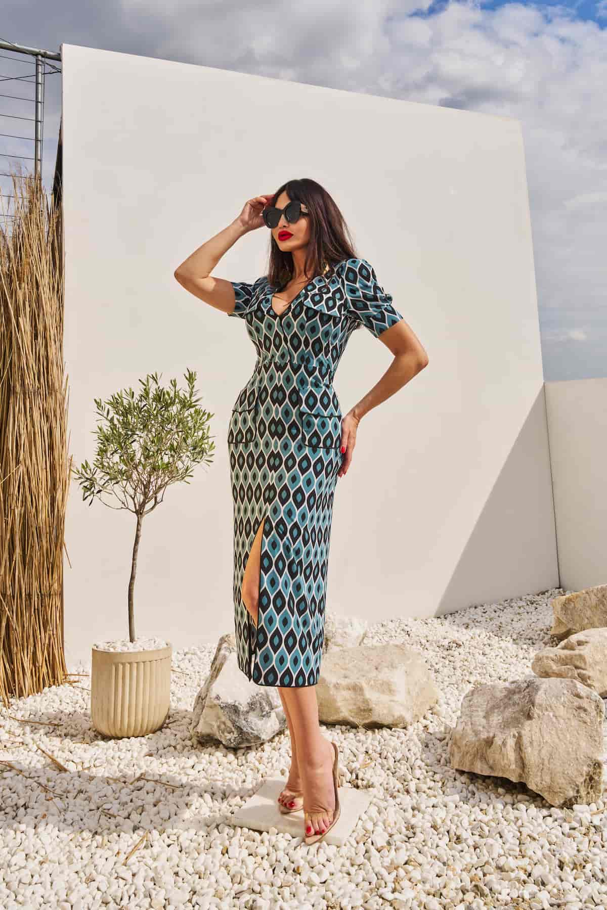 Green sheath dress with geometric print