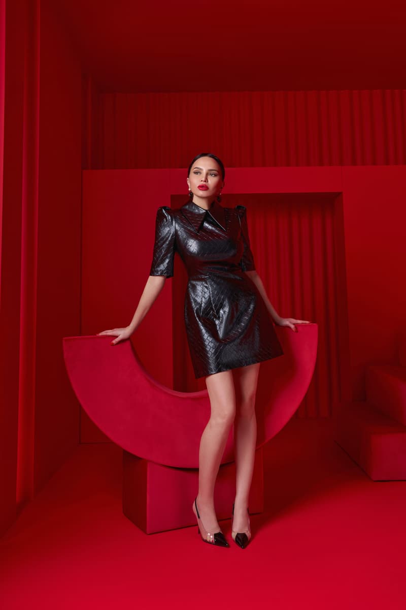Black leather mini dress with a pointed collar