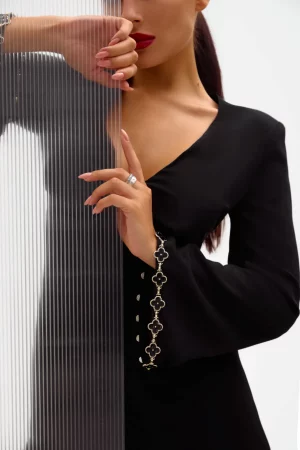 Black silhouette dress with a skirt - gode and trim with metal inserts on the sleeves - Image 3