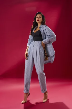 The pants are narrowed to the bottom in a stripe - Image 3