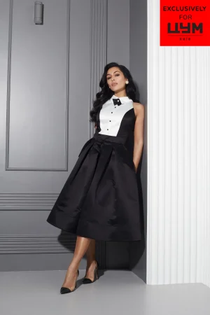 Midi dress with contrasting white tuxedo sleeve and full skirt