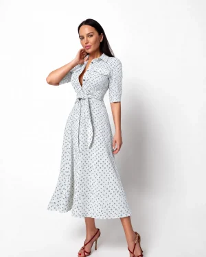 White dress with a geometric print and a sewn-in belt