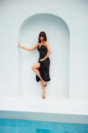Black silk dress with lace trim at the waist and chest